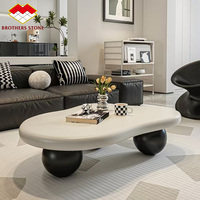 Table basse moderne en bois couleur crème nuageux, style nordique chic noir et blanc pour salons, villas et hôtels