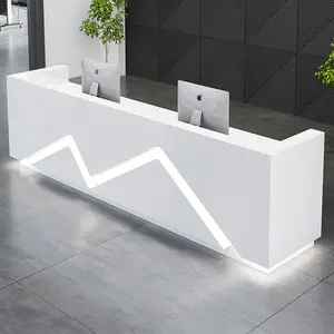 Custom moderna superficie solida Led bancone Hotel salone Spa cassiere in legno bianco in piedi scrivania della Reception con