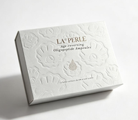 Boîte rigide de style livre gaufrée en gros avec insert en mousse EVA pour emballage cosmétique de luxe