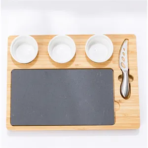 Rectangular slate cheese board set with knife and 3 bowls set for meat, wine and cheese