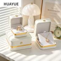 Coffret de luxe Huayue personnalisé en cuir PU blanc à coins arrondis pour bijoux