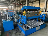 Fournisseur de machines de formage de rouleaux pour silos agricoles BN avec parois en acier verni et toiture en tuiles ondulées, dotées de moteur et de boîte de vitesses