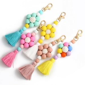 Porte-clés à pompon en silicone tressé avec perles florales pour femme, motif chien et panda, breloque de sac, vente chaude - Product Image 1