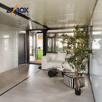 Casa Contenedor Expandible ZYBOX de 40 pies, con Energía Solar, Fuera de la Red, Cargador para Vehículos Eléctricos, Almacenamiento de Baterías, Agua Caliente, ADU, Casa Prefabricada Inteligente