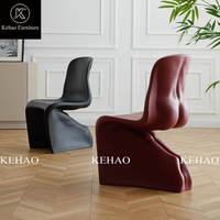 Chaise d'appoint sculpturale monobloc en plastique renforcé de fibres, design moderne, certifiée CE pour une utilisation intérieure et extérieure