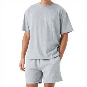 เสื้อยืดลำลองผู้ชายสไตล์สตรีทแวร์สำหรับฤดูร้อน ระบายอากาศได้ดี ผ้าถักเนื้อนุ่ม สวมใส่สบาย เหมาะสำหรับใช้ในชีวิตประจำวัน พร้อมกางเกงขาสั้นเข้าชุด - Product Image 1