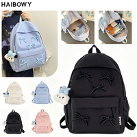 Sac à dos scolaire léger pour adolescentes HAIBOWY, multi-poches, mignon, avec nœud décoratif, pour activités de plein air et sport