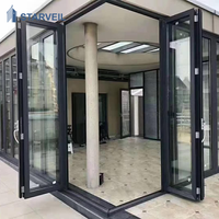 Porte patio pliante moderne en aluminium avec verre isolant Low-E pour l'entrée et la rénovation de la maison