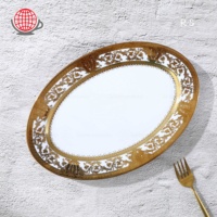 Service de table en céramique électro-plaquée de luxe en or fin, service de table blanc en gros d'usine pour les fêtes