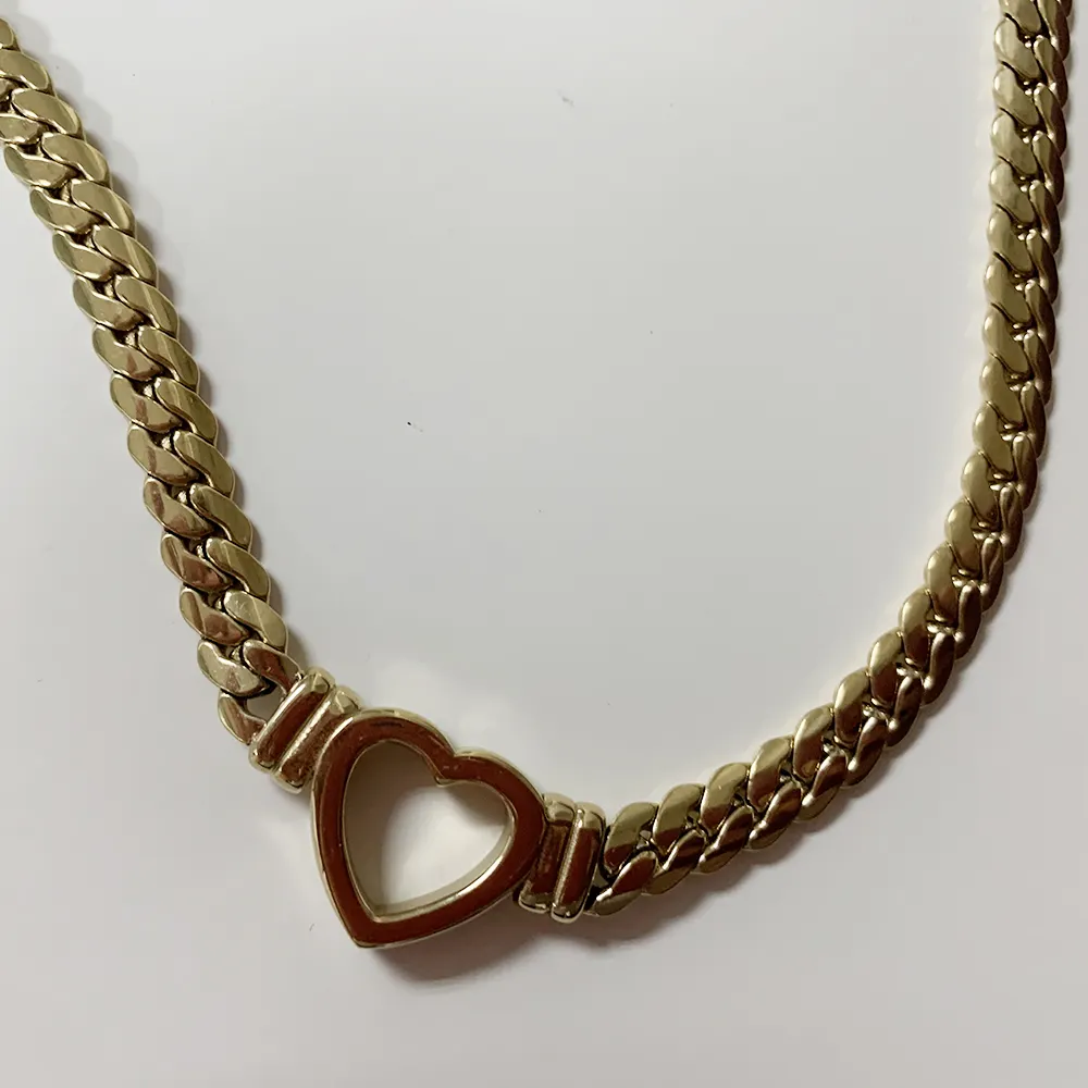 Girocollo in acciaio inossidabile a forma di cuore girocollo gioielli Non appannati collana a catena cubana a cuore in oro 18 carati prezzi all'ingrosso per le donne