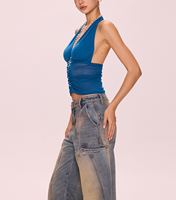 2025 fiesta moda Hit nuevo diseño profundo cuello en V azul Halter malla botón superior decoración transpirable tejido de punto ecológico