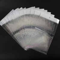 Sacs en plastique transparents personnalisés avec impression en héliogravure, adhésifs, avec bande OPP pour l'expédition et l'emballage de vêtements