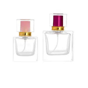 Frascos de perfume al por mayor, frascos vacíos divididos cuadrados transparentes de 50ml, con una tapa de color de 100ml de spray fino en la boca