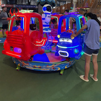 Vente en gros d'usine attrayant carrousel électrique 4 places avec hélicoptère et astronaute pour enfants pour parcs extérieurs