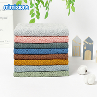 Venta al por mayor de fábrica: Mantas de punto Mimixiong para recién nacidos, de color liso con patrones huecos, mantas de algodón para envolver bebés.