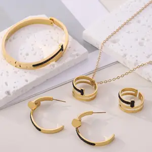 China 2023 Women 18K Gold Plated Stainless Steel Rings For Women Jewelry Stainless Earings Zircon Necklace Bracelet Sets Trade