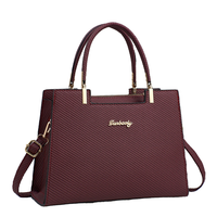2025 nouvelle mode dames Litchi motif décontracté fourre-tout sac à main simple épaule fermeture éclair chaînes PU 20L lavage à la main en gros d'âge moyen