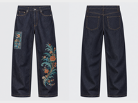 Jeans en denim décontracté pour homme, couleur indigo foncé, avec broderie florale asymétrique