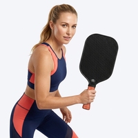 Raquette de pickleball Pro T700 en fibre de carbone, surface texturée noire, noyau en nid d'abeille de 16 mm, cadre thermoformé pour l'entraînement