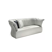 Fauteuil d'appoint moderne personnalisé en velours cannelé, chaise longue ondulée côtelée pour hôtel, villa, salon