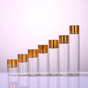 Suministro de fábrica: Botella dispensadora de líquidos con tapa dorada sensible a la presión, con vástago de peonía de vidrio, para cosméticos y dispensación de líquidos. - Product Image 1