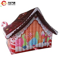 Bateau rapide commercial gonflable maison de noël pain d'épice Santa grotte cabine gonflable pour la décoration d'événements de noël