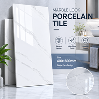 Carrelage mural et de sol en céramique de porcelaine effet marbre brillant 400x800mm, durable et résistant aux taches, pour projets hôteliers, résidentiels et commerciaux