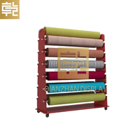 Présentoir sur mesure double face pour rouleaux de tissu, tapis, nappes et cuir, avec roulettes