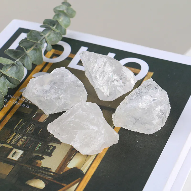 Prezzo di fabbrica cristalli naturali pietre curative quarzo trasparente pietre grezze grezze