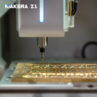 Machine de gravure laser industrielle Makera Z1 avec changeur d'outils rapide, nivellement automatique, caméra intégrée et intelligence artificielle