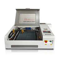 Petite machine portable de découpe et de gravure laser Co2 Machine de gravure de timbres Machine de gravure laser sur bois