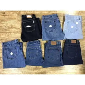 Stock coupe étiquette surproduction jeans d'occasion usine hommes jeans usagés coton jeans 2021 avec un bon matériau vêtements d'occasion