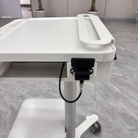 Chariot médical mobile moderne pour ordinateur portable, réglable pneumatiquement, garantie 5 ans, idéal pour les visites en salle d'hôpital – Vente directe usine