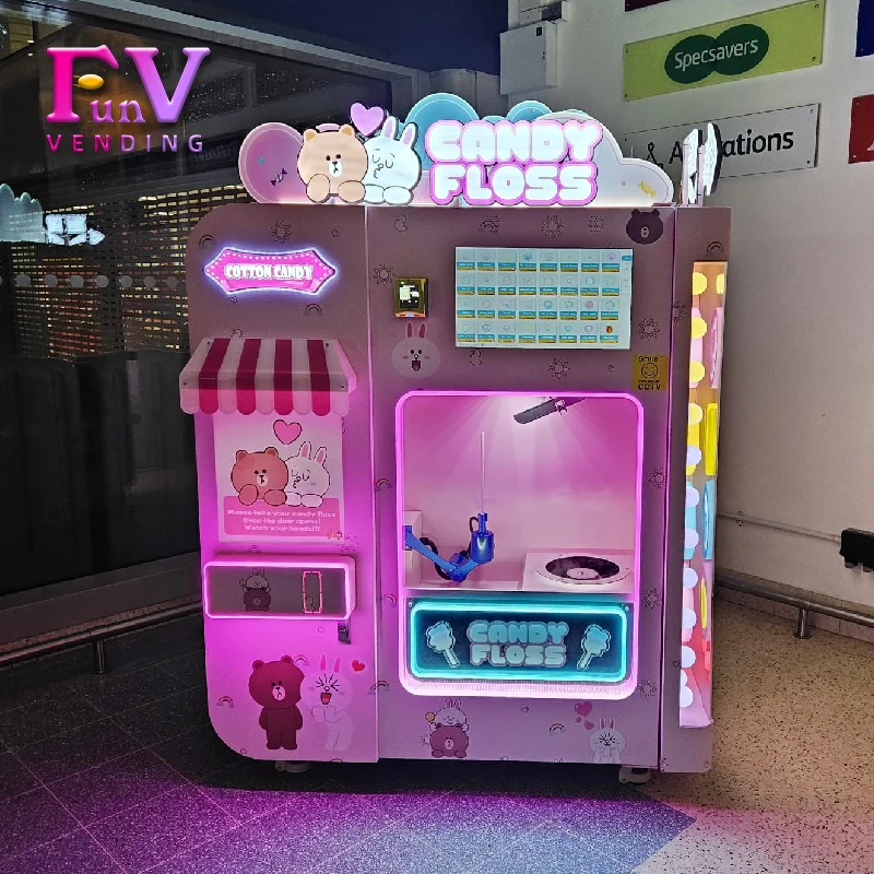 China Factory Direct Verdienen Sie Geld Kommerzielle Kinder rosa Automatische Zuckerwatte Süßigkeiten Automaten Roboter für Verkauf Party