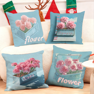 Pink carnations in vintage metal <strong>boxes</strong> adorn cozy <strong>cushions</strong> with festive holiday decor in the background. - Product Image 1