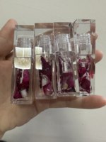 Teinte à lèvres hydratante longue durée waterproof sous marque privée, brillant à lèvres transparent en gros, huile à lèvres à la rose