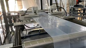 Mesin Ekstrusi Film Tiup Tiga Lapis ABA Otomatis Rotary Die dengan Double <span class=keywords><strong>Re</strong></span>-Winder Mesin Pembuat Film Tiup ABA - Product Image 5