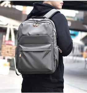 Sac à dos scolaire de haute qualité en vente chaude personnalisé Sac à dos USB Sac à dos tendance noir grand imperméable pour hommes Sac à dos - Product Image 1