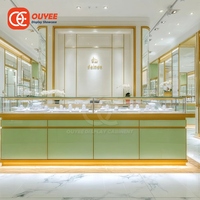 Présentoir à bijoux îlot en aluminium de qualité supérieure, vitrine de comptoir pour bijouterie dorée