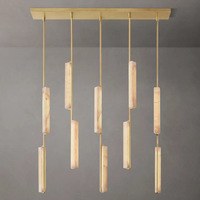 Lustre rond moderne de luxe en albâtre espagnol naturel, avec panneau en pierre et finition laiton doré, pour salon et salle à manger