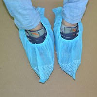 Protège-chaussures jetables non tissés antidérapants anti-poussière à motif roue pour laboratoire, visites à domicile, vente en gros, OEM