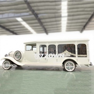 Limousine électrique blanche de style vintage avec roues chromées et intérieur élégant - Product Image 2