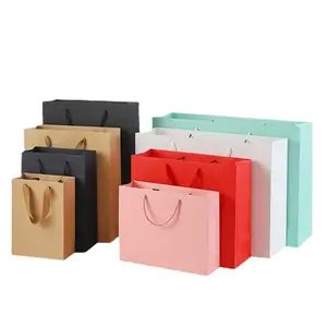 Custom printed wholesale luxury paper shopping bags with rope ribbon cord handles and your own logo