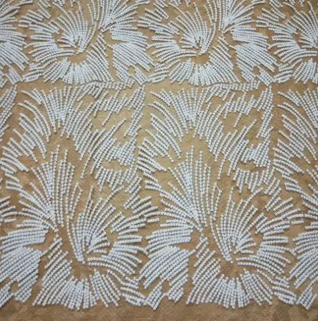 Wasser löslicher Textil stoff aus weißer Spitzens tickerei aus Nylon netz