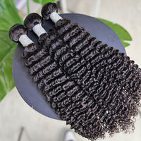 Venta al por mayor 100% cabello humano real rizado trama de extensiones de cabello de alta calidad Color Natural vietnamita pelo crudo Paquete de Color negro