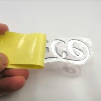 Étiquettes d'emballage auto-adhésives 3D en plastique PVC avec logo personnalisé de sortie d'usine pour ordinateur et téléphone portable