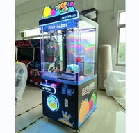 Machine de jeu d'arcade à monnayeur avec grue à griffes pour la distribution de balles porte-bonheur et la rédemption de prix, pour centre de divertissement familial (FEC) et enfants