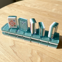 En stock : Ensemble de Mahjong américain de luxe en acrylique bleu sarcelle, tuiles translucides à motif papillon, Fan Winds, cadeau professionnel de boutique