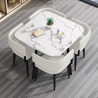 Ensemble de table à manger en pierre moderne, finition brillante, design gain de place, pieds en métal, 4 chaises en cuir artificiel pour la maison et l'hôtel
