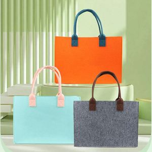 กระเป๋าถือผ้าสักหลาดคุณภาพสูง สีสันสดใส ความจุเยอะ รับทำโลโก้ตามสั่ง กระเป๋าโท้ทแบรนด์ดัง ของที่ระลึกธุรกิจ ของขวัญ - Product Image 6